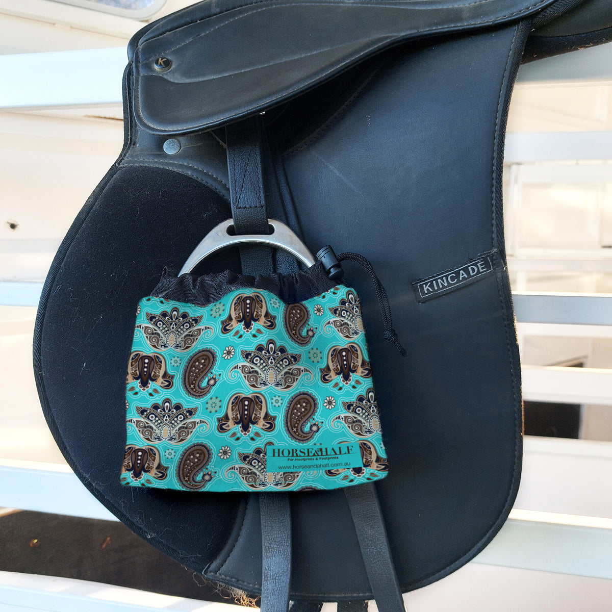 Teal Paisley Stirrup Covers on english saddle — Horse and a Half